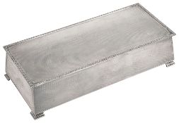 A large Elizabeth II silver table cigarette box