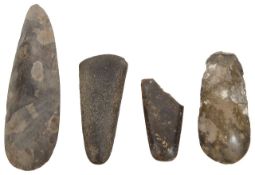 Four Neolithic polished flint and stone axe heads
