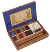 A mahogany artists watercolour paint box