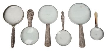 A group of six magnifying glasses