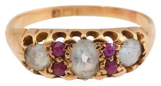 An aquamarine and ruby ring