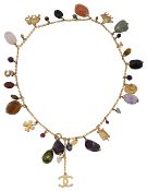 A Chanel hardstone and assorted charm necklace
