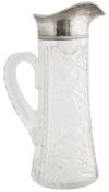 A late Victorian silver mounted cut glass water jug