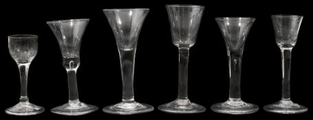 Six mid 18th century plain stem wine glasses