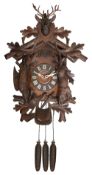 A large Swiss black forest cuckoo automaton wall clock c.1900
