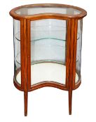 An Edwardian Sherton revival satinwood vitrine