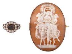 A yellow gold and seed pearl memorial ring