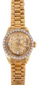 A lady's gold and diamond Rolex Oyster Watch