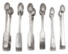 A George III pair of bright cut sugar tongs and our other pairs