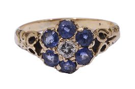 A diamond and sapphire cluster ring
