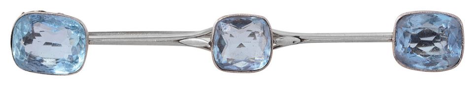 An aquamarine three stone brooch