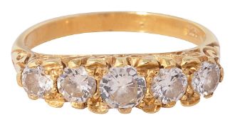 A diamond five stone ring