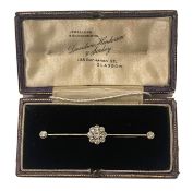 A diamond-set knife edge bar brooch