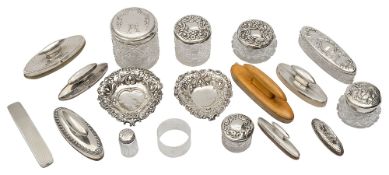 Silver lidded dressing table jars and nail buffers etc.