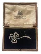 A diamond-set foliate spray brooch