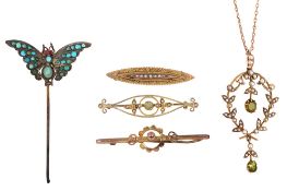 An Edwardian half pearl and peridot pendant on chain