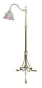 An Edwardian brass reading lamp