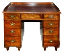 A Victorian mahogany pedestal ship's desk.