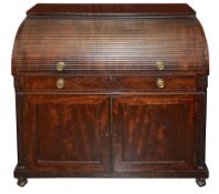A William IV mahogany roll top bureau