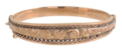A 9ct gold hinge bangle
