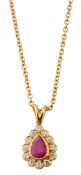 A ruby, diamond-set and 18ct yellow gold pendant