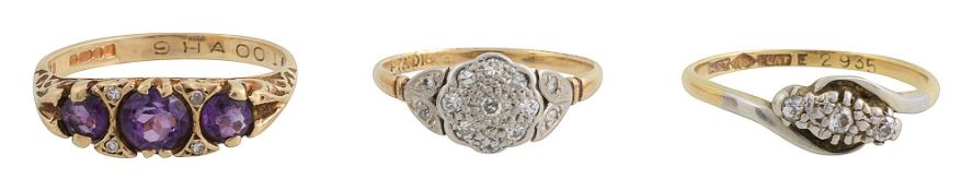 A group of three gem set rings