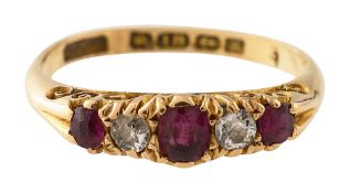 An 18ct ruby inset ring