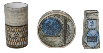 A Troika pottery wheel vase, and two other examples.