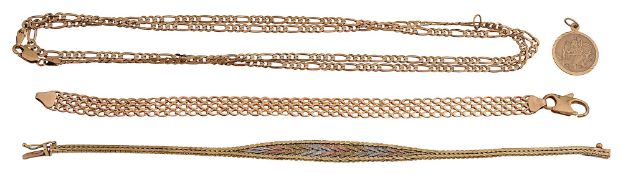 A group of gold accessories