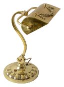 An Edwardian brass banker's lamp and Pullman lamp