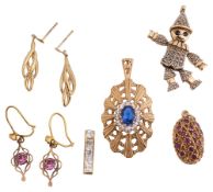 A group of gold pendants