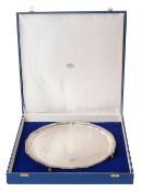 An Elizabeth II cased large silver salver