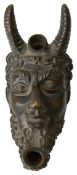 An Italian Renaissance style patinated bronze satyr oil lamp