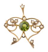 An Edwardian peridot and half pearl brooch/pendant