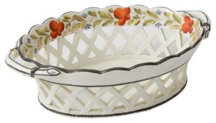 An early 19th century creamware twin handled chestnut basket c.1800