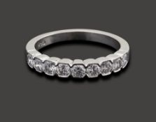 A diamond half hoop ring