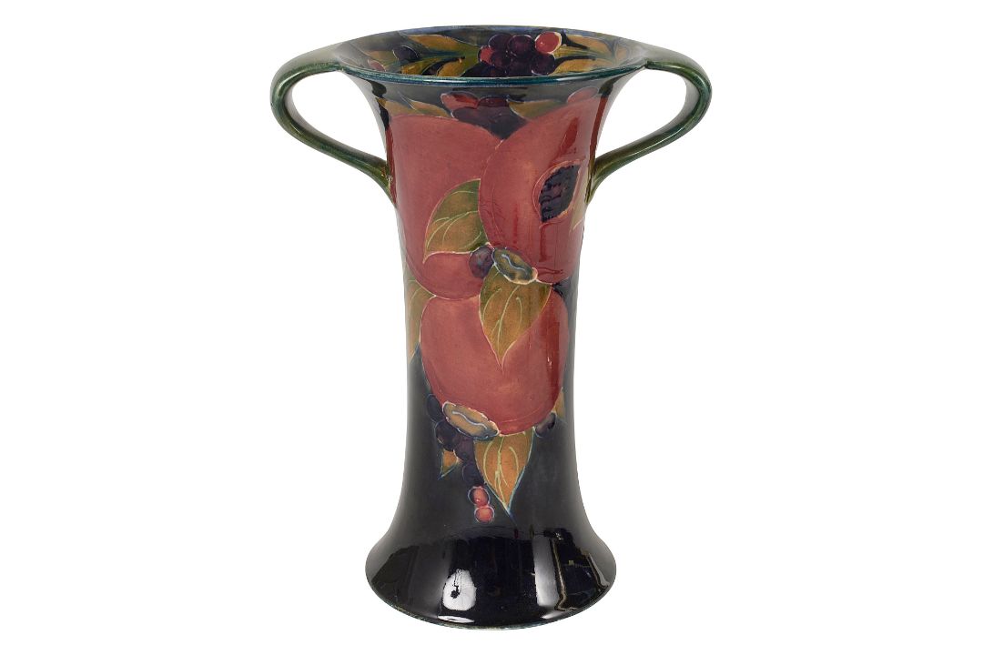 A William Moorcroft pomegranate pattern twin handled vase - Image 1 of 2