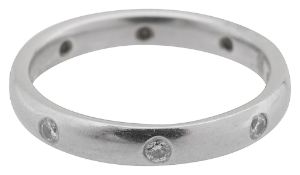 A platinum and gem set ring