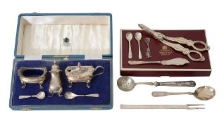 An Elizabeth II pair of silver grape shears, cased silver three piece cruet set and other silver