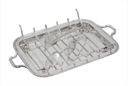 A George V silver asparagus serving set