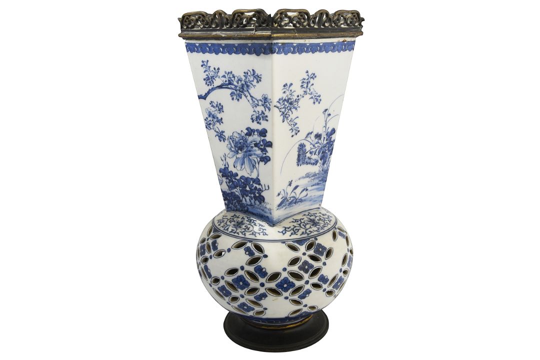 A Japanese bronze mounted blue and white double walled reticulated vase