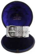 A Victorian silver buckle hinge bangle
