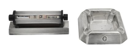 An Eilzabeth II silver perpetual desk calender and ashtray