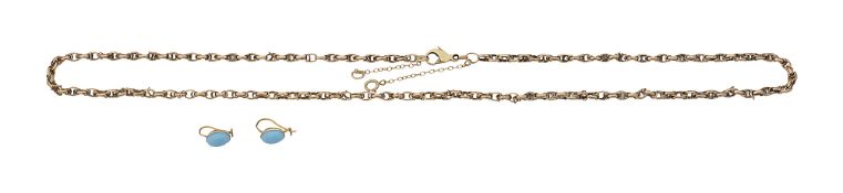 A pair of turquoise ear pendants