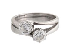 Two diamond single stone rings