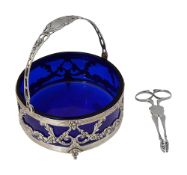 A Hanau silver swing sugar basket + pair of early George III sugar tongs