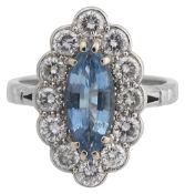 A blue topaz and diamond-set cluster ring