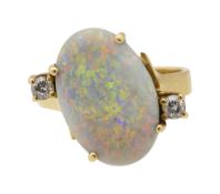 An opal and diamond ring