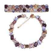 A costume necklace with matching bracelet