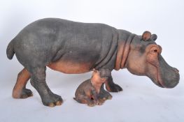 20TH CENTURY BOXED RESIN HIPPO SCULPTURE